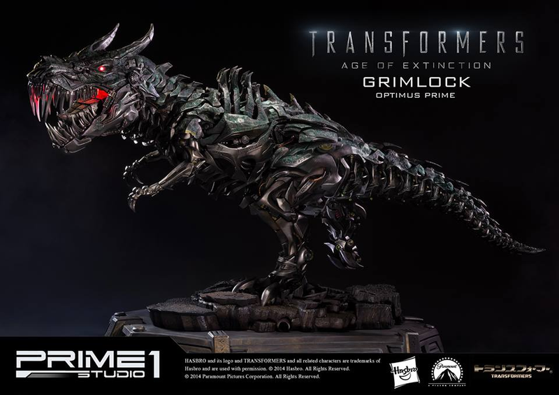 Illustration for article titled Glorious Grimlock and Optimus Prime Statue